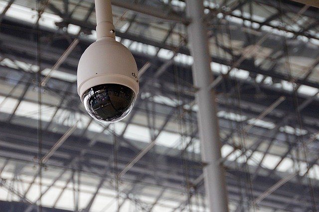 Dome CCTV camera covering a commercial building